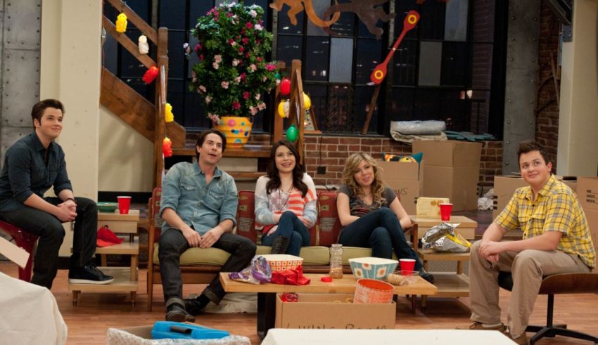 A group of people sitting on couches in a living room.