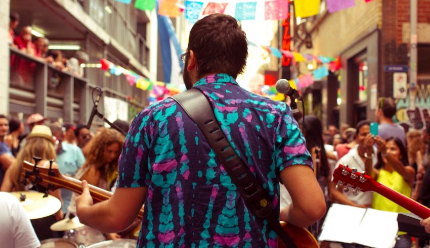 A group of people playing music on a street.