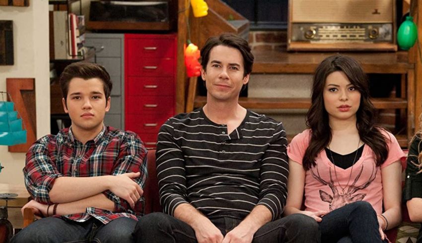 A group of people sitting on a couch.