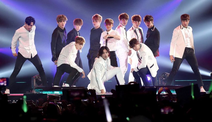 A group of korean boys performing on stage.