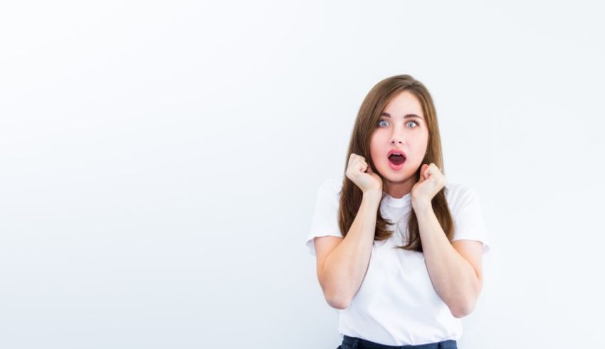 A young woman with a surprised look on her face.