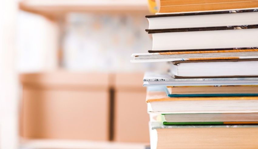 A stack of books on a shelf.