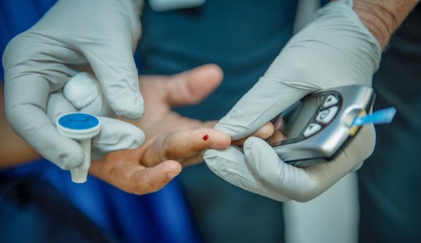 A doctor is giving a blood test to a patient.