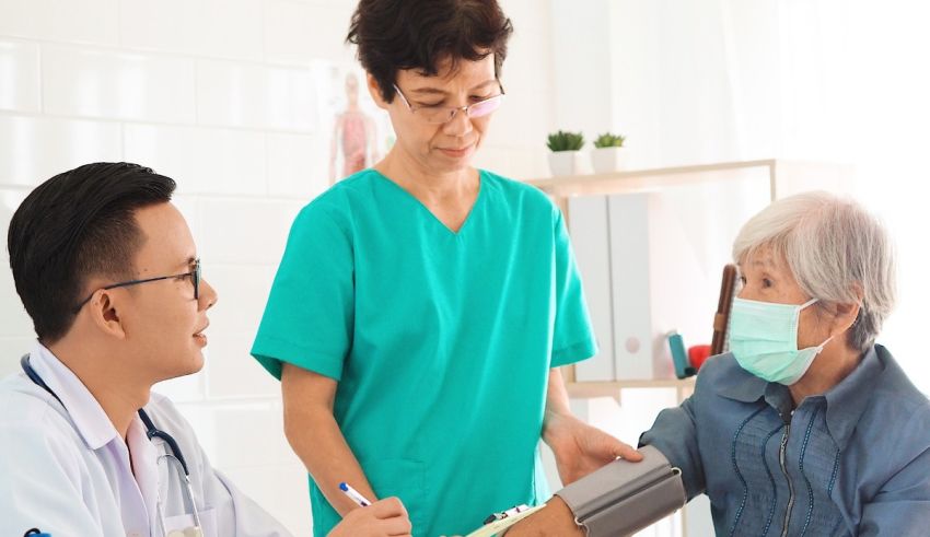 A doctor is taking a patient's blood pressure.