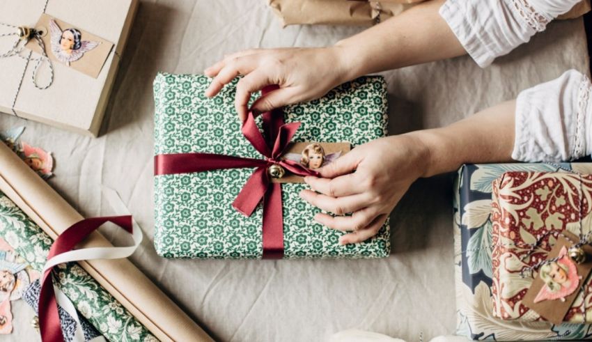 A person wrapping a present.
