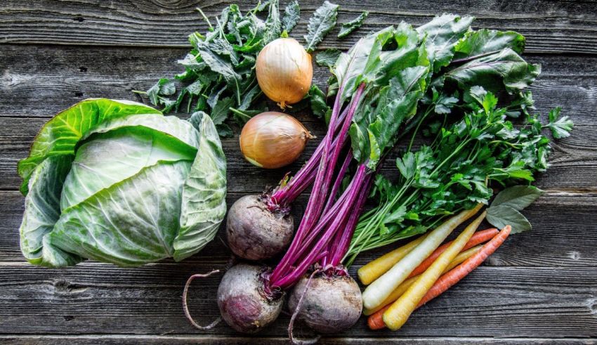 Fresh vegetables on a wooden table.
