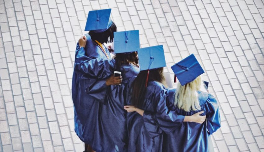 A group of graduates wearing graduation gowns.