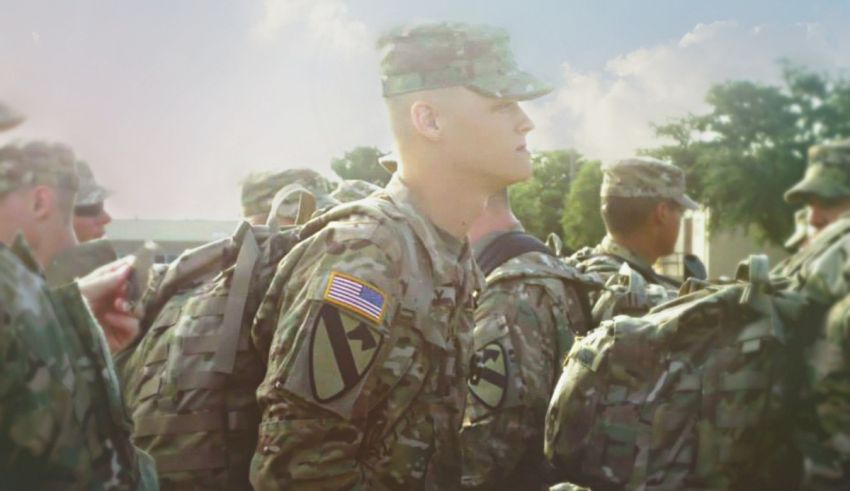 A group of soldiers are standing in a group.