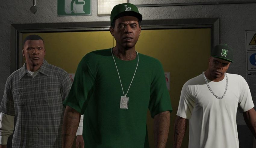 A group of men in green shirts standing next to each other.