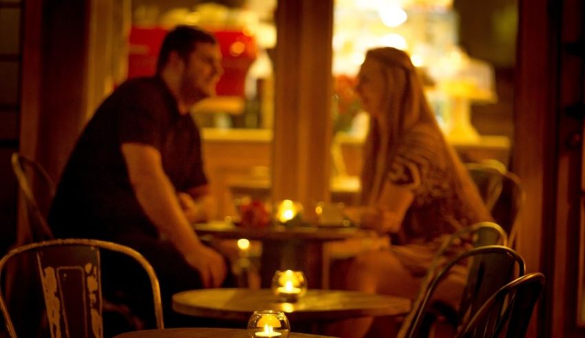 A couple sitting at a table.
