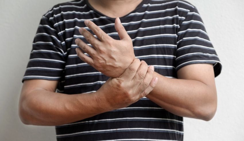 A man with a pain in his hand.