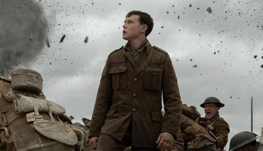 A man is standing in front of a group of soldiers.