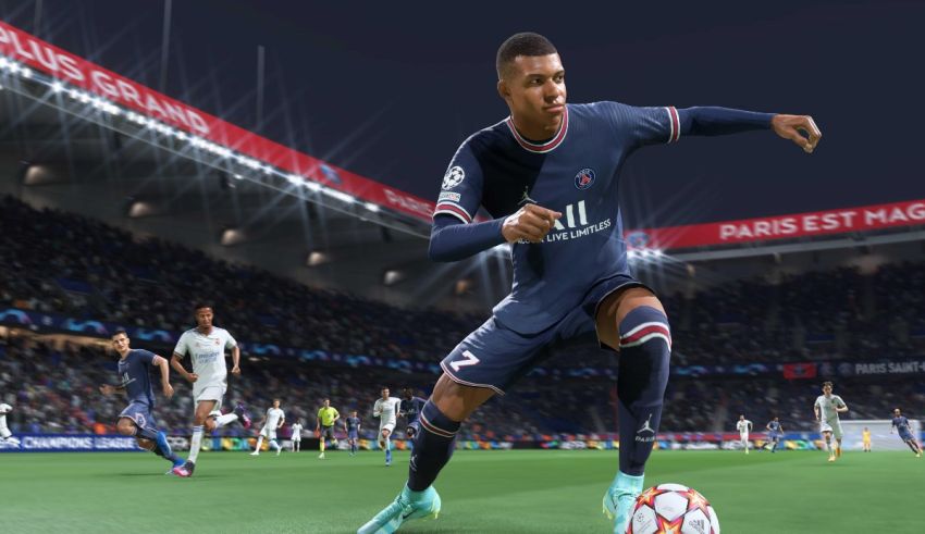 A soccer player is kicking the ball in a video game.
