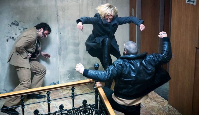 A man and a woman are jumping up and down on a staircase.