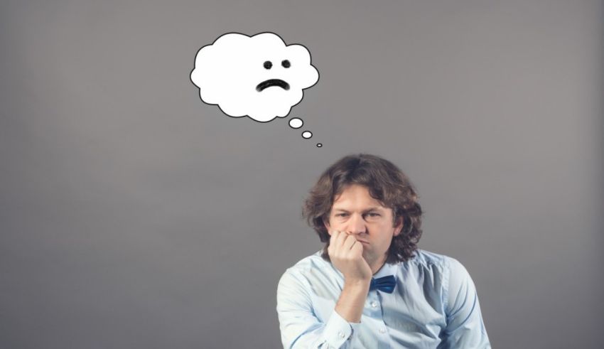 A man with a thought bubble over his head.