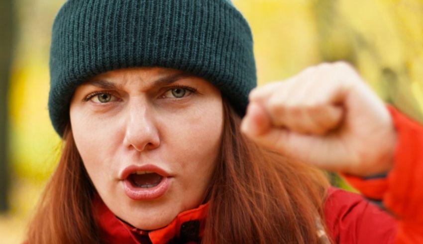 A woman in a red beanie is fist fist fist fist fist fist fi.