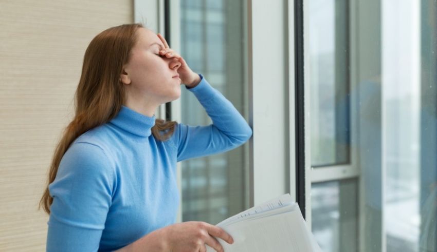 A woman looking out of a window.