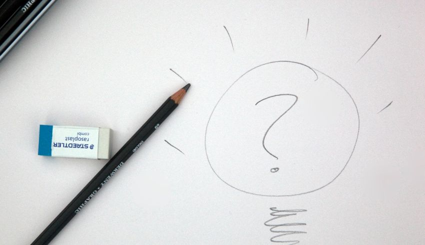 A light bulb with a question mark drawn on it.