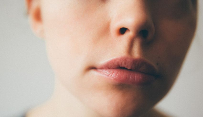 A close up of a woman's face.