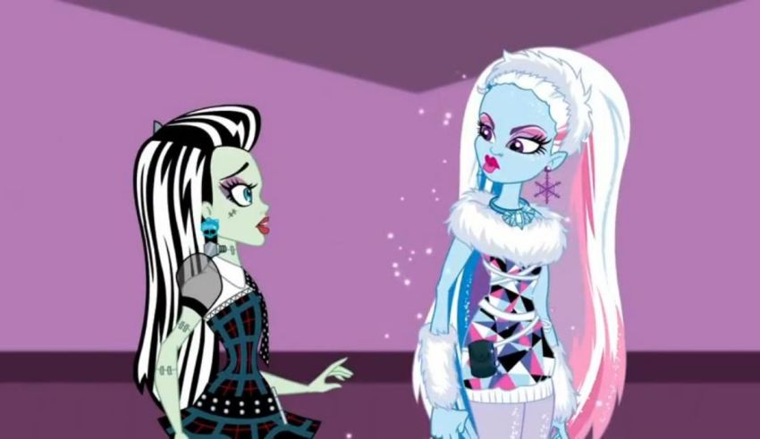 Two monster high characters are standing next to each other.