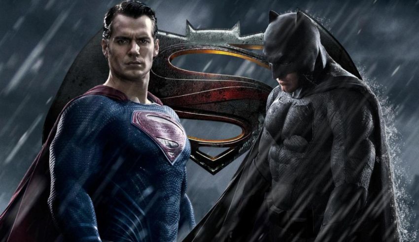 Superman and batman in the rain.