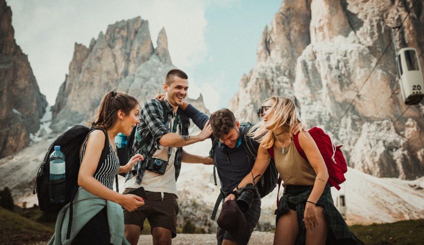 A group of friends having fun in the mountains.