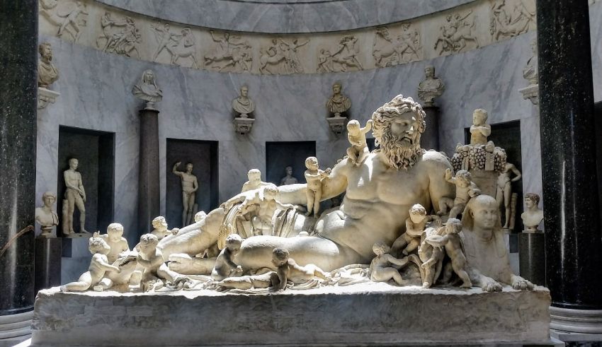 A large statue of a man surrounded by other statues.