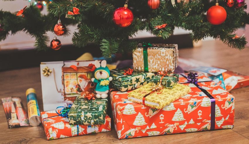 Christmas presents under a christmas tree.