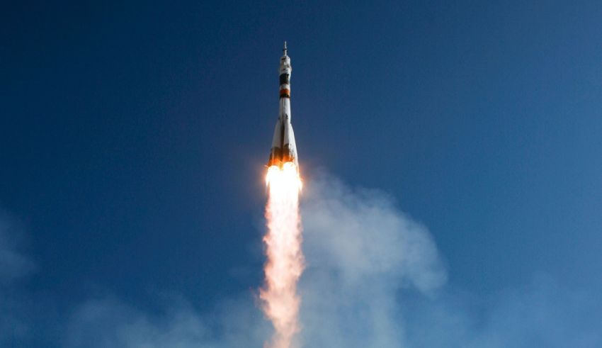 A rocket with smoke coming out of it.