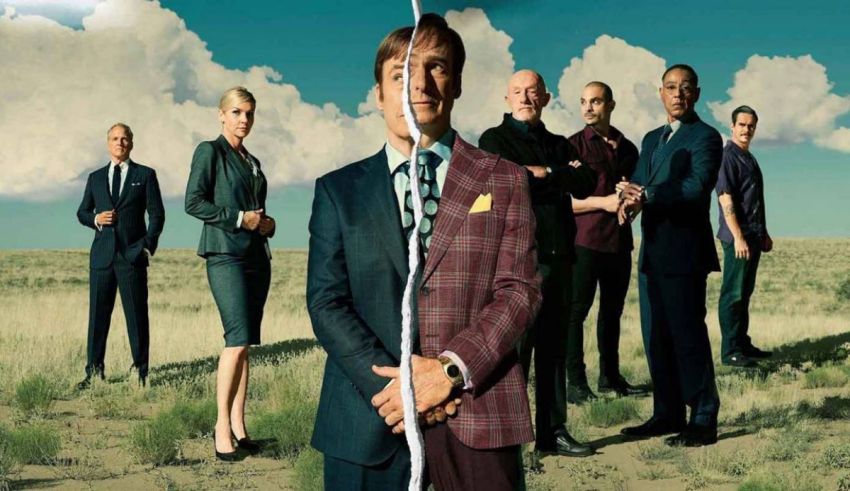 A group of people standing next to each other in a field.