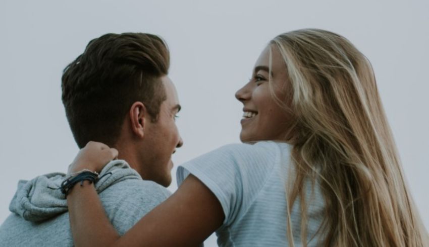 A man and a woman looking at each other.