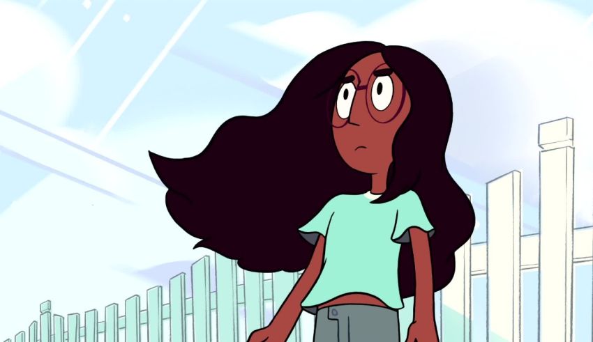 A cartoon girl standing in front of a fence.