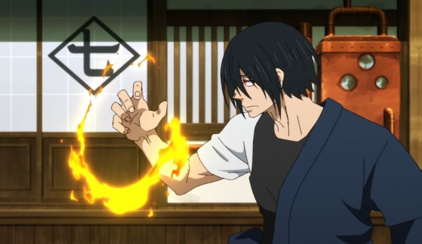 A man in a kimono is holding a flame in his hand.