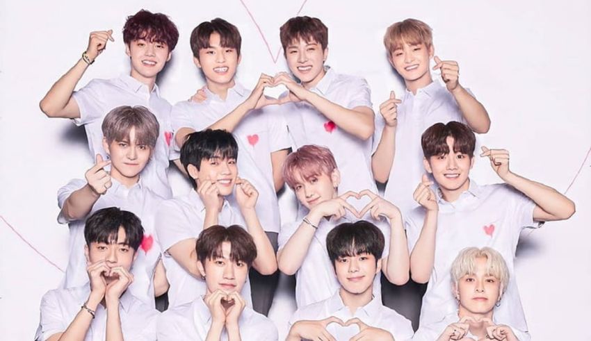A group of korean boys posing for a photo.