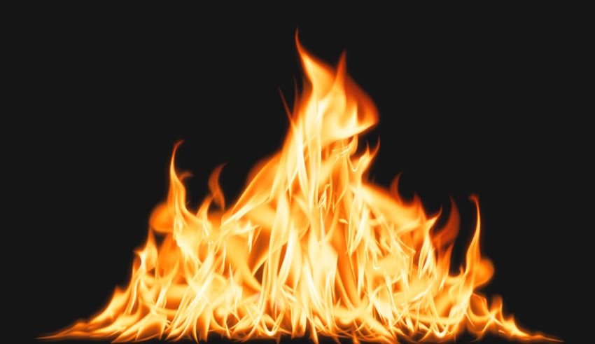A flame on a black background.