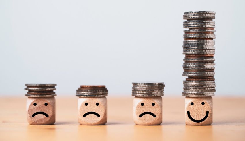 A stack of coins with a smiley face on top.