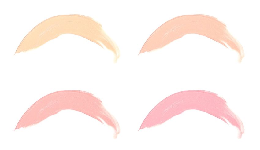 Four different colors of blushes on a white background.