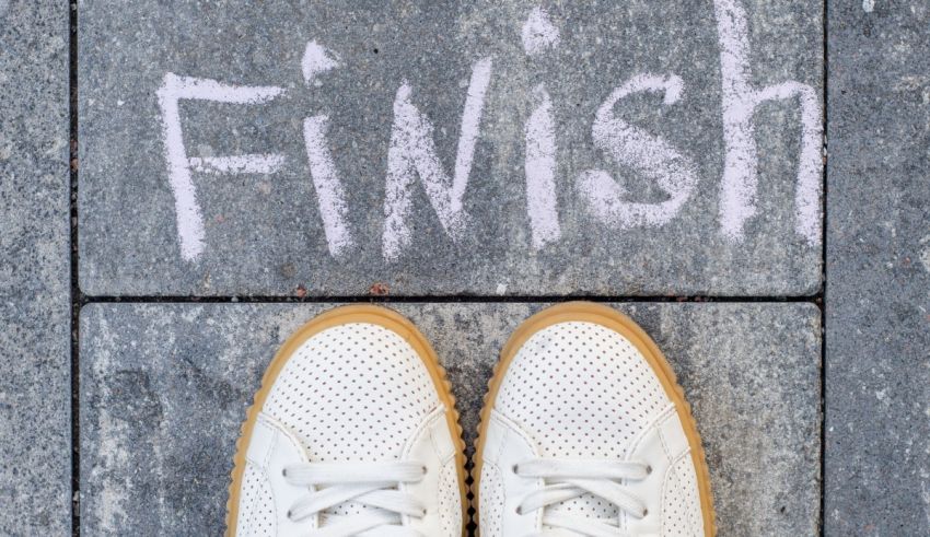 White shoes with the word finish written on them.
