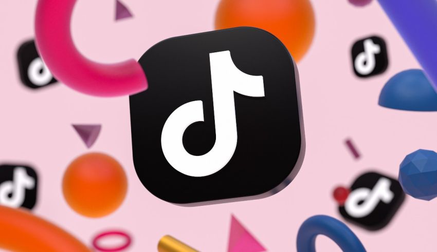 The tiktok logo is surrounded by colorful objects.