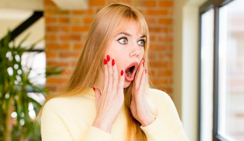 A woman with a surprised look on her face.