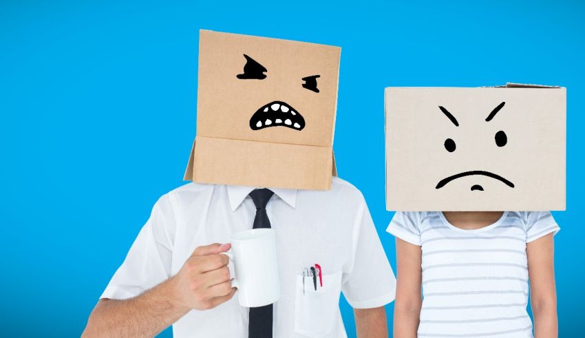 Two people with cardboard boxes on their heads.