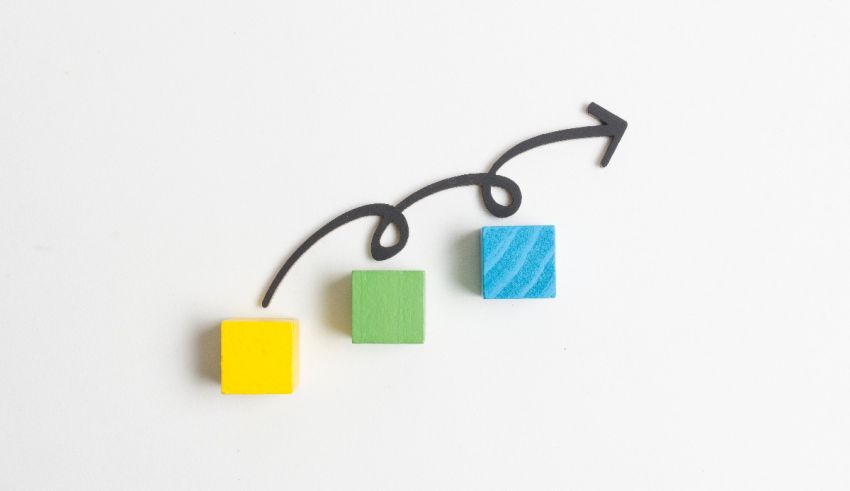 A set of colorful wooden blocks on a white background.
