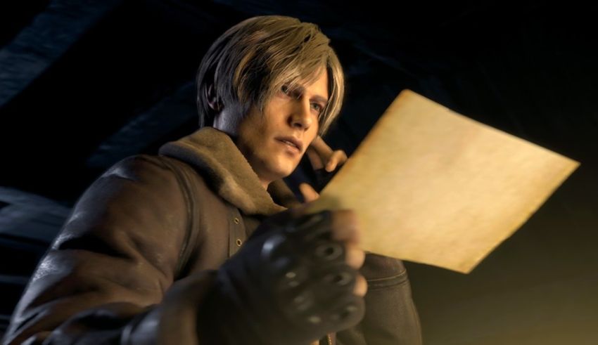 A man is holding a piece of paper in his hand.