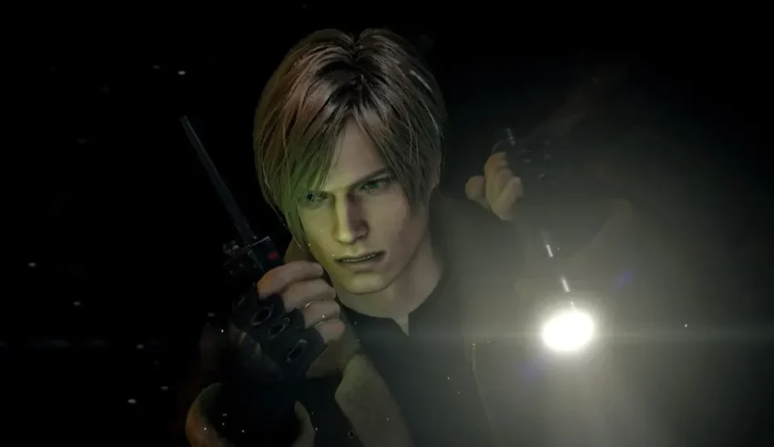 A man holding a flashlight in the dark.