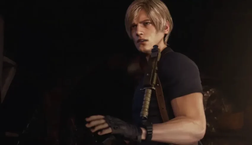 A man holding a gun in a dark room.