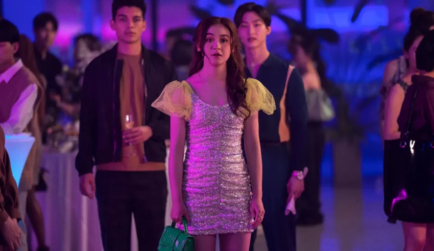 A group of people standing at a party.