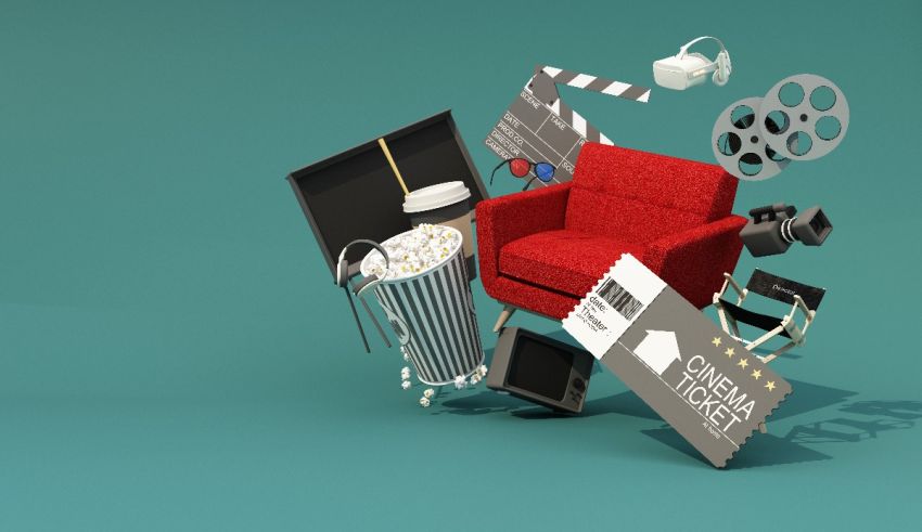 A red chair is surrounded by movie claps and other items.