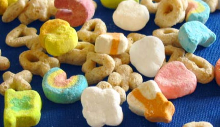 A pile of cereal with a variety of colors and shapes.