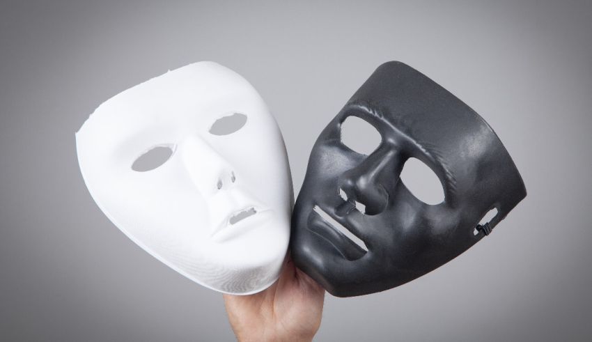 Two black and white masks on a gray background.