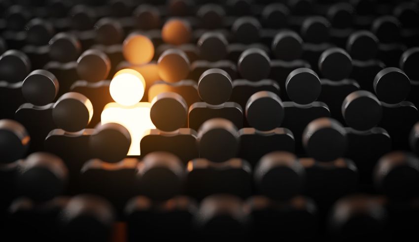 A person standing out in a crowd of people.